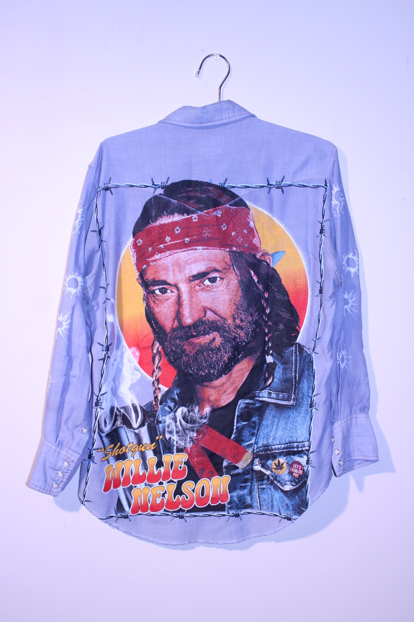 Willie Nelson on pearl Snap Wrangler western button up (L)