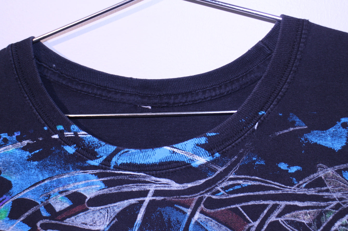 Aeon Flux on Lightly faded unkown blank tee (L)