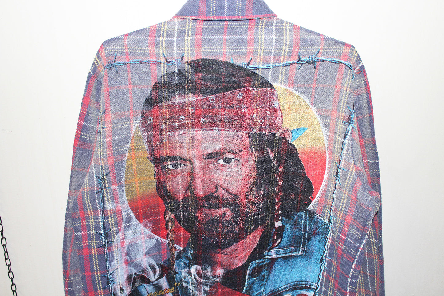 Willie Nelson on faded BIG MAC flannel (L)