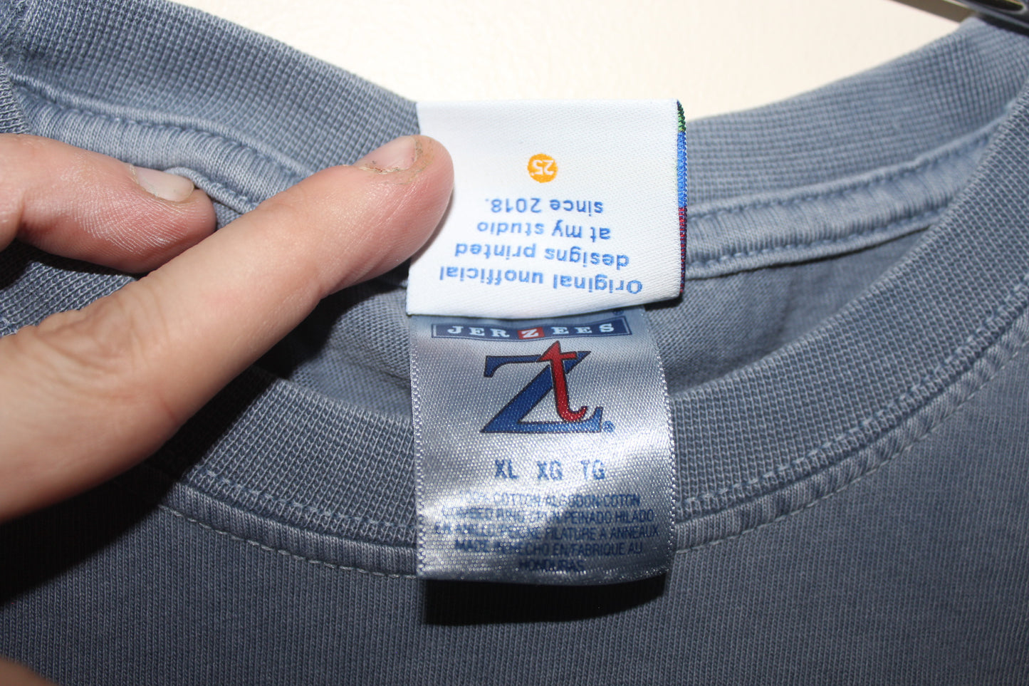 Faded blue Hellraiser on y2k Jerzees  (XL)