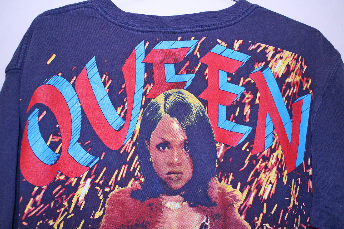 Lil Kim on faded navy carhatt tee (M-L)