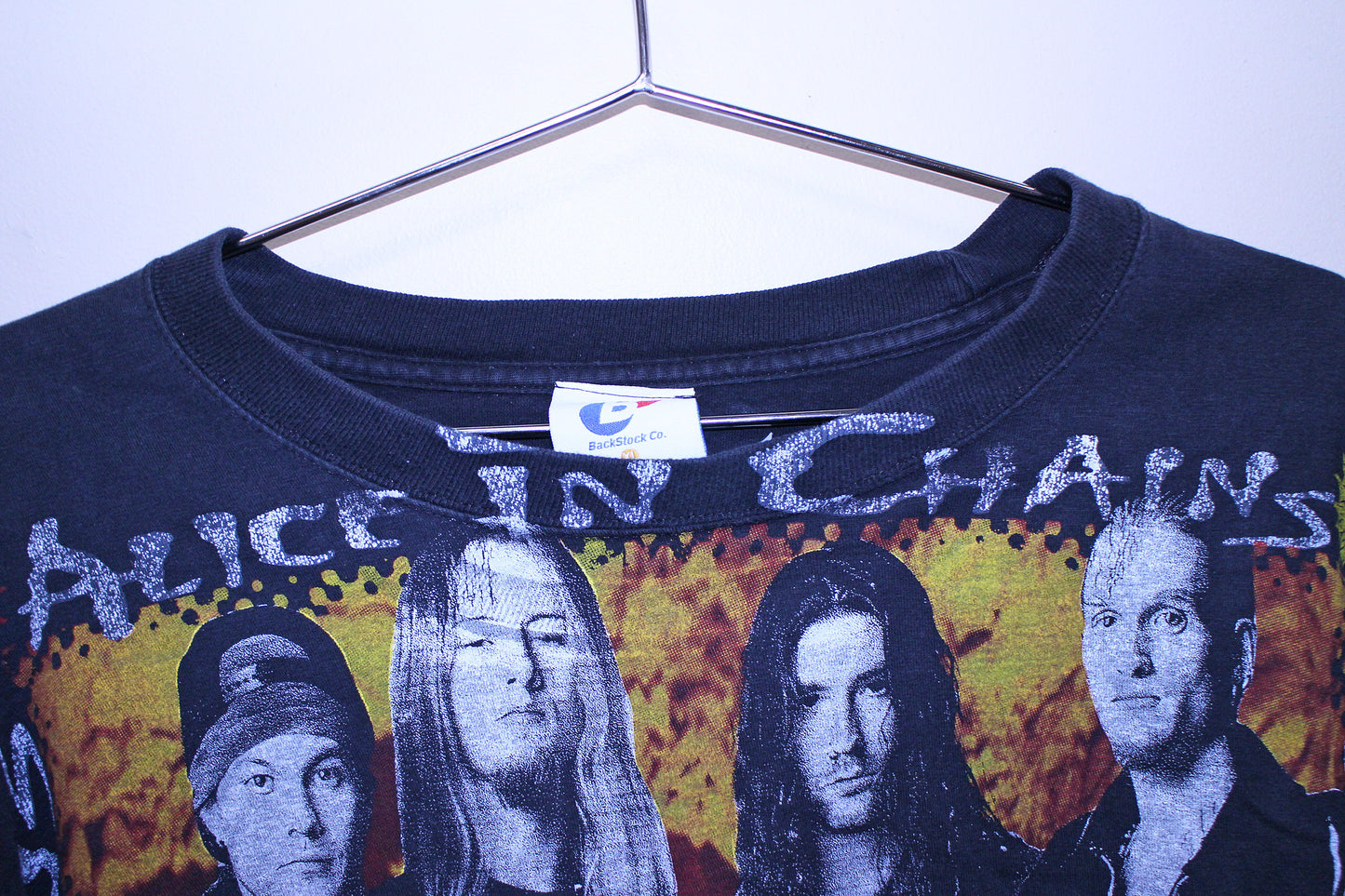AIC on faded longsleeve Beefy tee (XL)