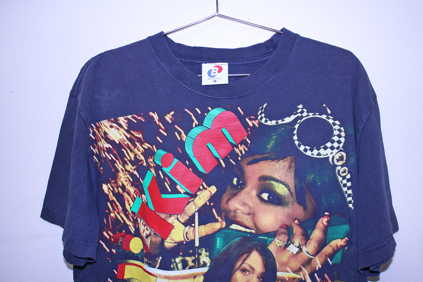 Lil Kim on worn & faded Dickies black tee (L)