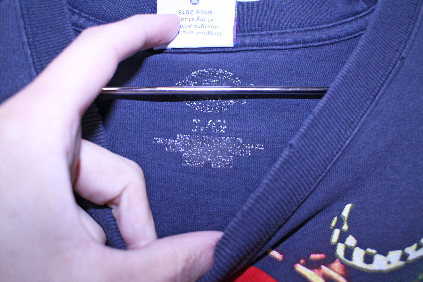Lil Kim on worn & faded Dickies black tee (L)