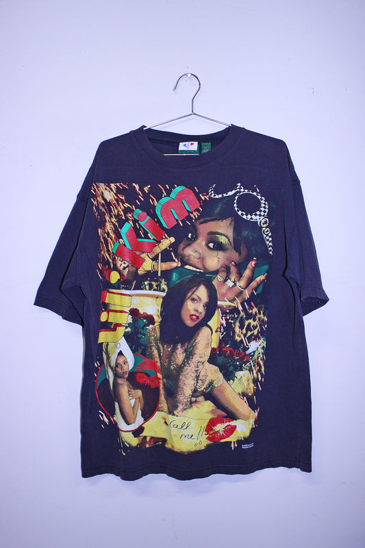 Lil Kim on Navy vintage A.Eagle Tee (L)