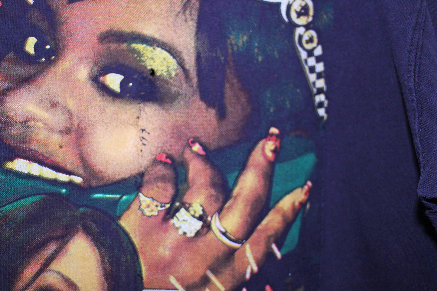 Lil Kim on Navy vintage A.Eagle Tee (L)