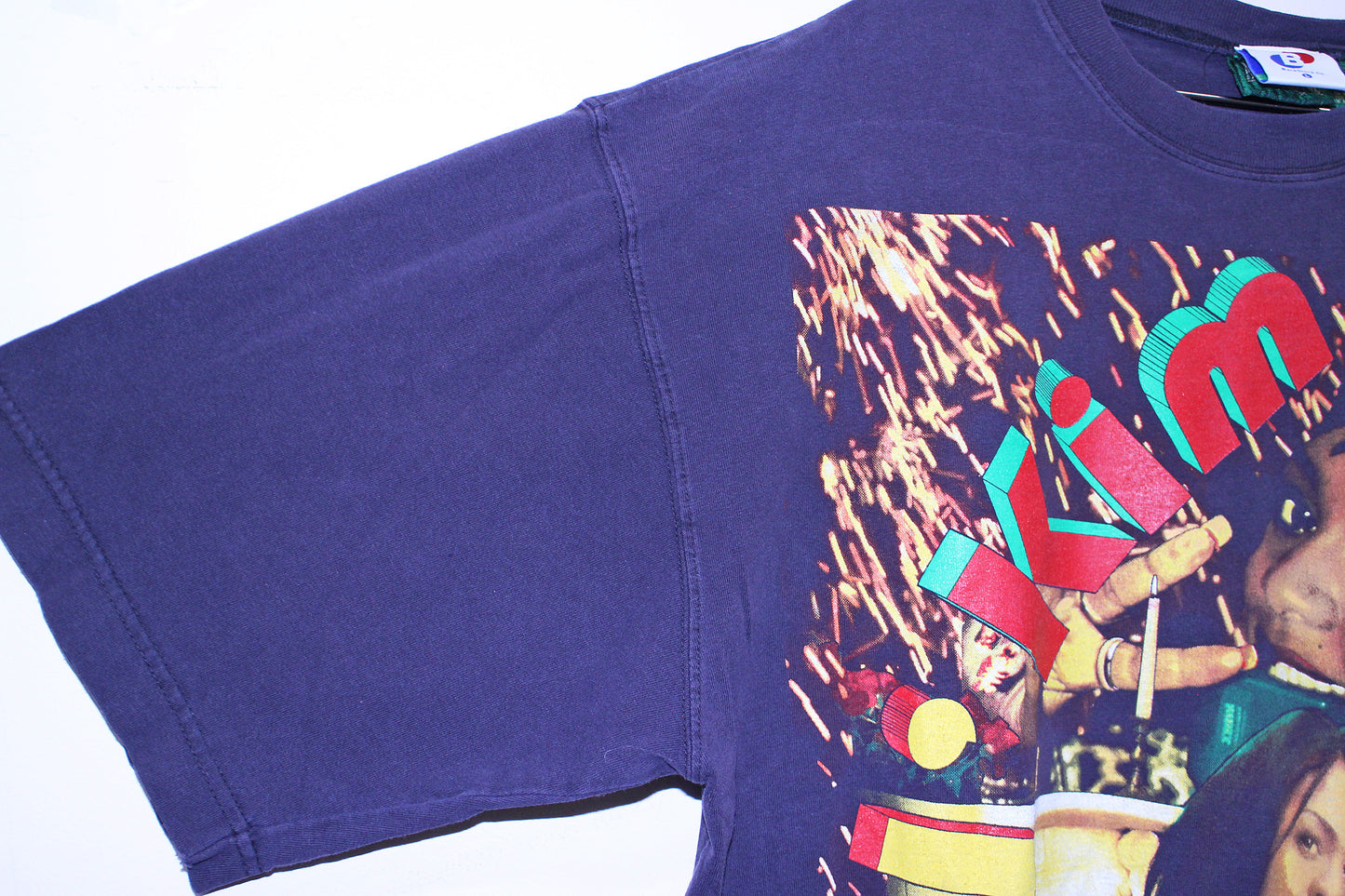 Lil Kim on Navy vintage A.Eagle Tee (L)