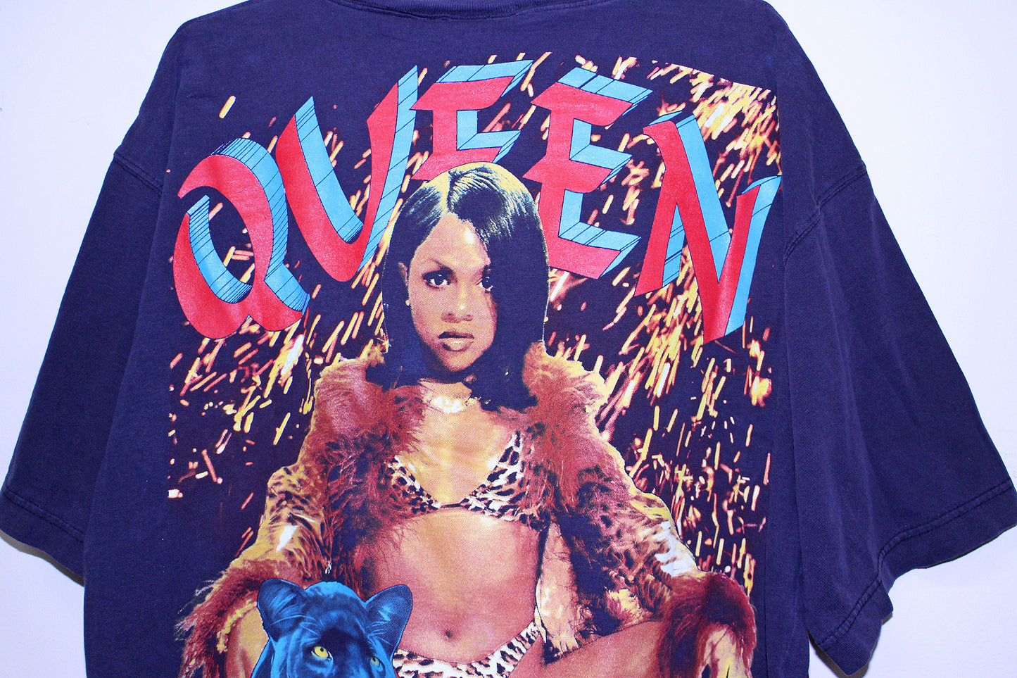 Lil Kim on Navy vintage A.Eagle Tee (L)